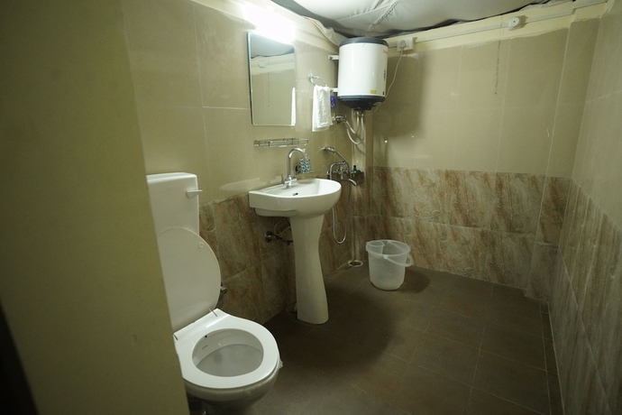Imagen de la habitación del Hotel The Kamru Riverside Camps and Resorts. Foto 15