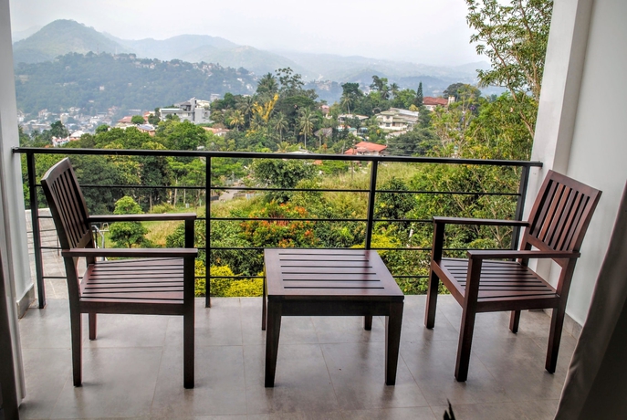 Imagen de la habitación del Hotel The Kandyan Villa. Foto 17
