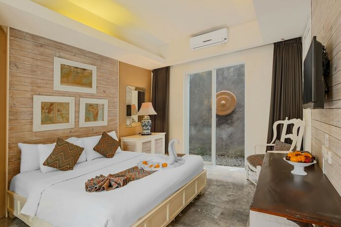 Imagen de la habitación del Hotel The Kanjeng Suites Petitenget. Foto 9