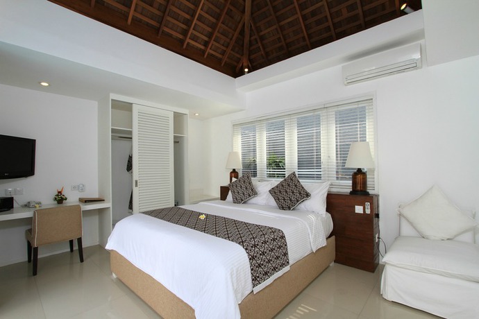 Imagen de la habitación del Hotel The Kanjeng Suites and Villas Seminyak. Foto 6