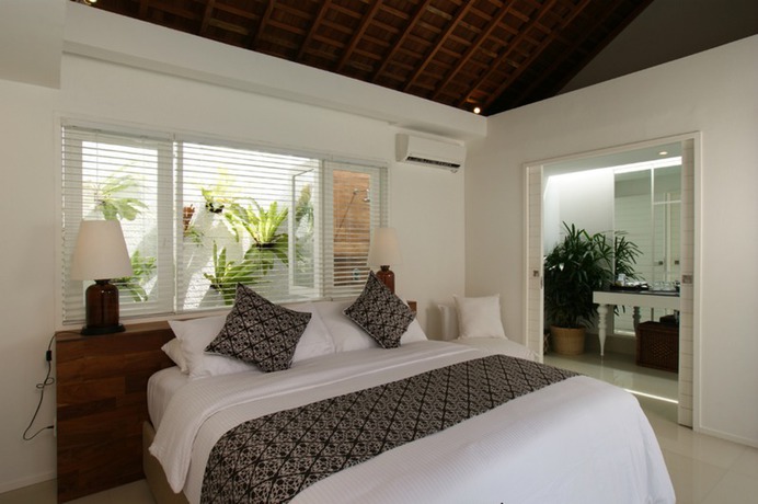 Imagen de la habitación del Hotel The Kanjeng Suites and Villas Seminyak. Foto 11