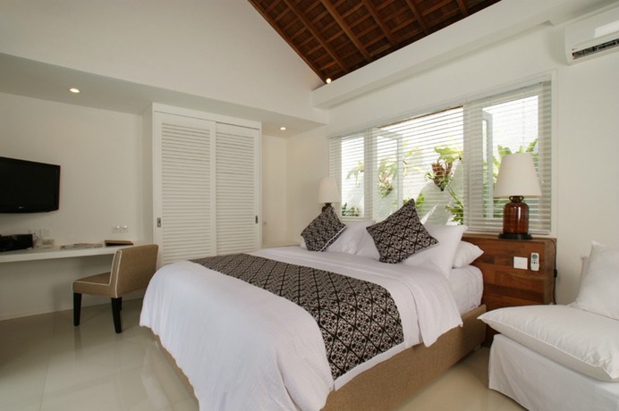Imagen de la habitación del Hotel The Kanjeng Suites and Villas Seminyak. Foto 12
