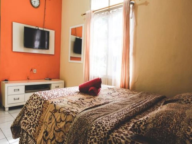 Imagen de la habitación del Hotel The Kanzi and Village. Foto 2