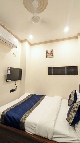 Imagen de la habitación del Hotel The Kashi Elegance Varanasi. Foto 4