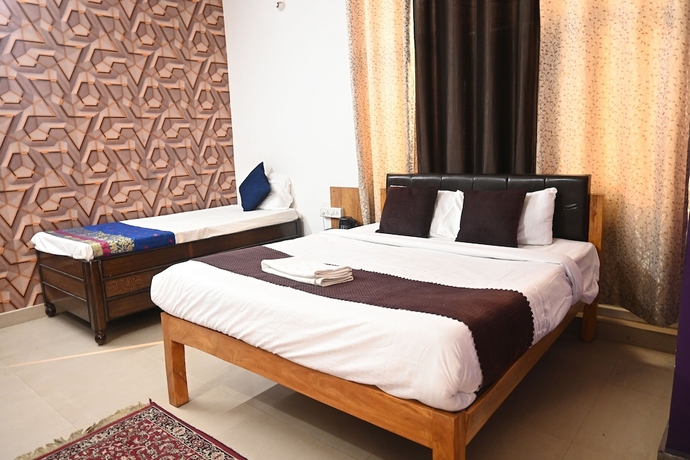 Imagen de la habitación del Hotel The Kashi Palace. Foto 4