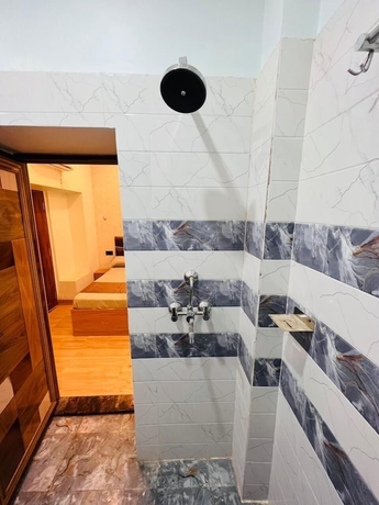 Imagen de la habitación del Hotel The Kashi Yatra Inn. Foto 14
