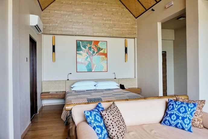 Imagen de la habitación del Hotel The Kasturi. Foto 7