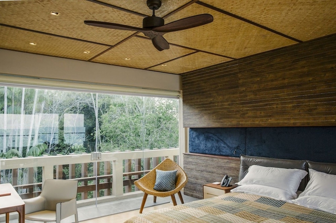 Imagen de la habitación del Hotel The Kasturi. Foto 12