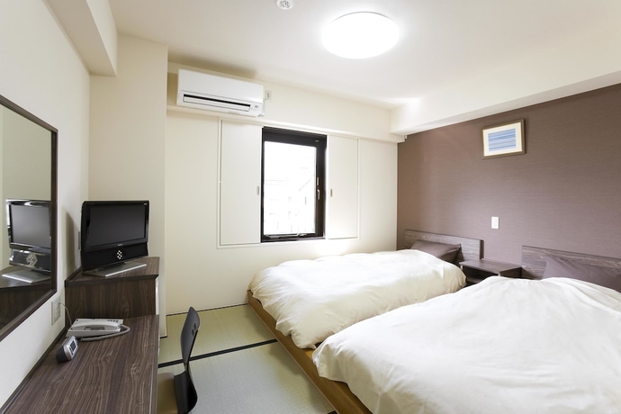 Imagen de la habitación del Hotel The Kato. Foto 5