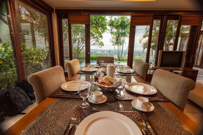 Imagen de la habitación del Hotel The Kawan Jimbaran. Foto 10