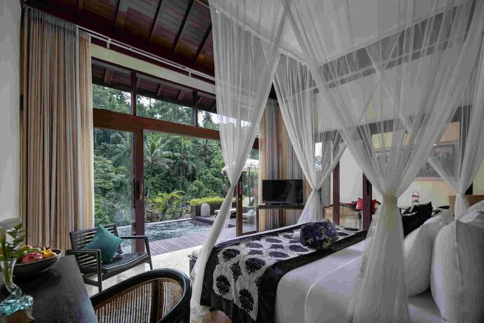 Imagen de la habitación del Hotel The Kayon Valley Resort Ubud. Foto 15