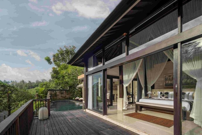 Imagen de la habitación del Hotel The Kayon Valley Resort Ubud. Foto 19