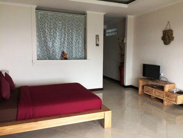 Imagen de la habitación del Hotel The Kayuan. Foto 14