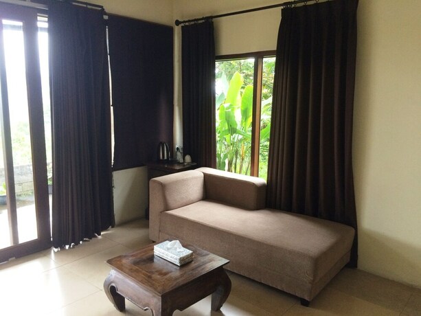 Imagen de la habitación del Hotel The Kayuan. Foto 17