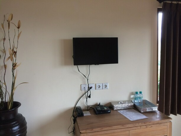 Imagen de la habitación del Hotel The Kayuan. Foto 19