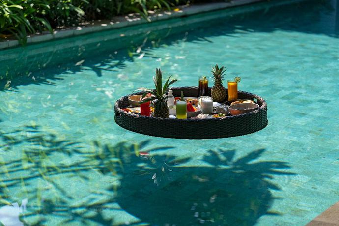 Imagen de la piscina del Hotel The Kemilau and Villa Canggu - Chse Certified. Foto 20