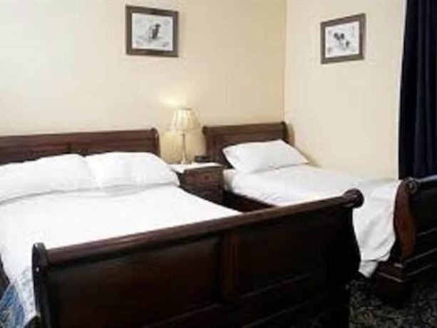 Imagen de la habitación del Hotel The Kenbridge. Foto 8