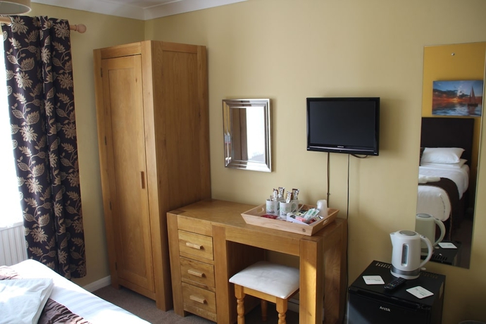 Imagen de la habitación del Hotel The Kenbury. Foto 7