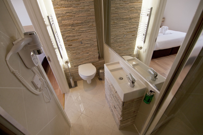 Imagen de la habitación del Hotel The Kensington Studios. Foto 9