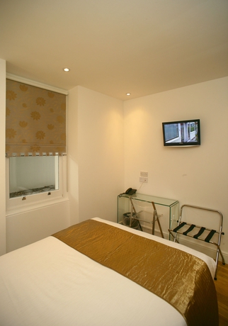 Imagen de la habitación del Hotel The Kensington Studios. Foto 14