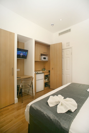 Imagen de la habitación del Hotel The Kensington Studios. Foto 15