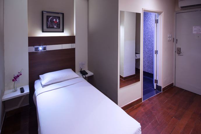 Imagen de la habitación del Hotel The Keong Saik. Foto 6