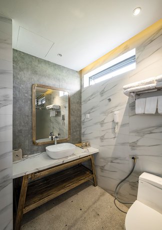 Imagen de la habitación del Hotel The Kila Boutique. Foto 6