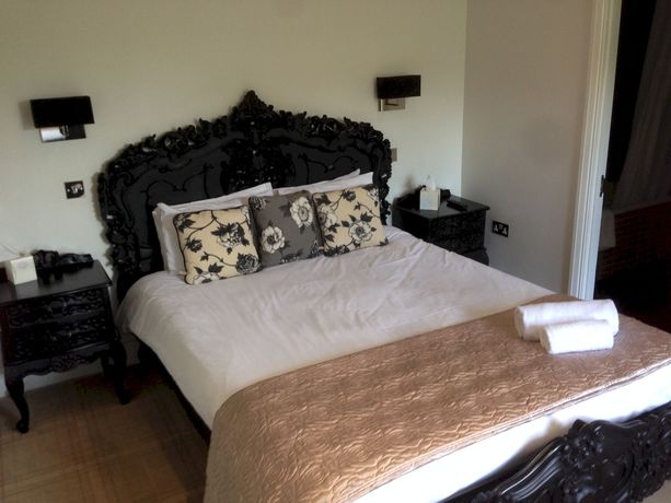 Imagen de la habitación del Hotel The Kilns. Foto 14