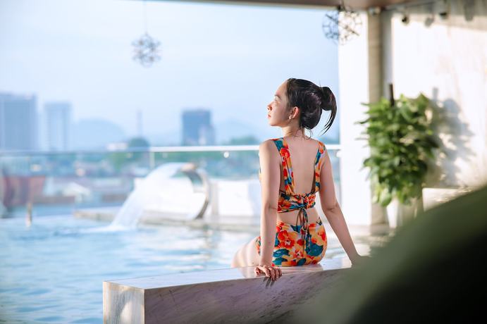 Imagen de la piscina del Hotel The King Hotel condotel Thai Nguyen. Foto 20