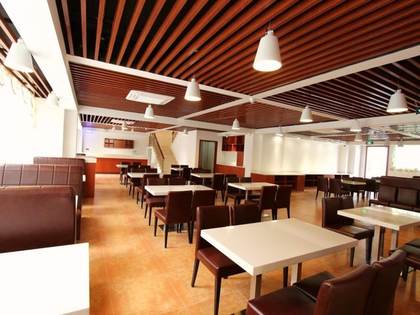 Imagen del bar/restaurante del Hotel The King Lycra. Foto 4