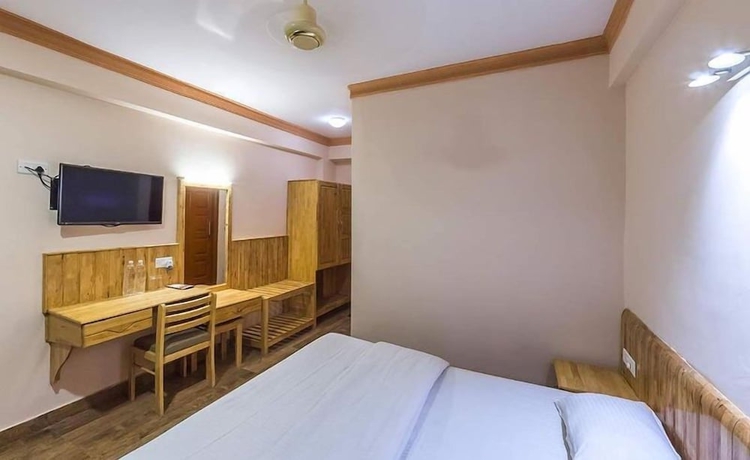 Imagen de la habitación del Hotel The Kingdom. Foto 8