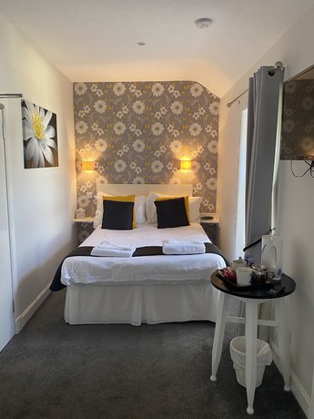Imagen de la habitación del Hotel The Kings Arms. Foto 9