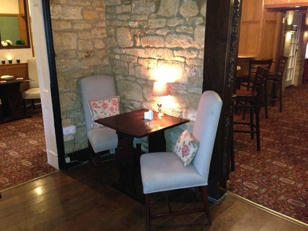 Imagen del bar/restaurante del Hotel The Kings Arms Inn. Foto 4