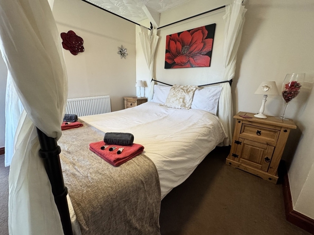Imagen de la habitación del Hotel The Kings Head inn. Foto 16