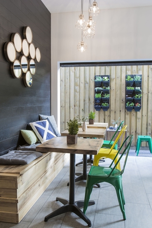 Imagen del bar/restaurante del Hotel The Kingsford, Ascend Collection. Foto 6