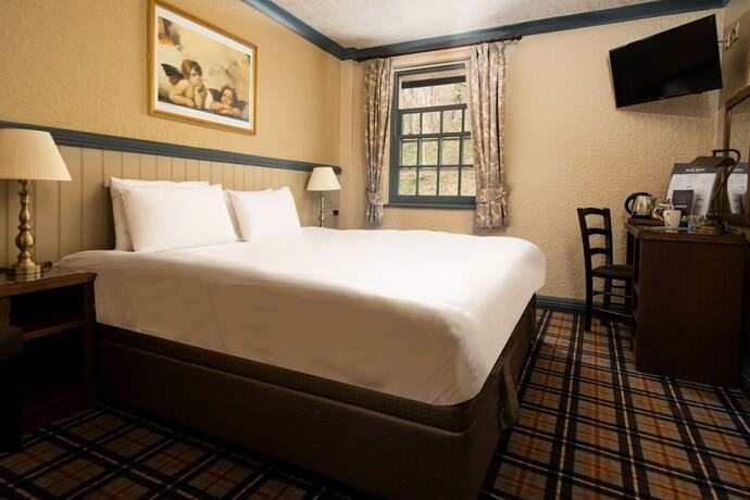 Imagen de la habitación del Hotel The Kingslodge Inn - The Inn Collection Group. Foto 15