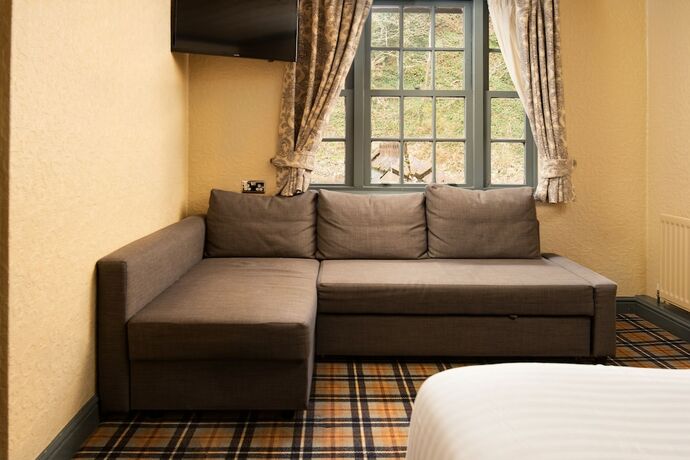 Imagen de la habitación del Hotel The Kingslodge Inn - The Inn Collection Group. Foto 16