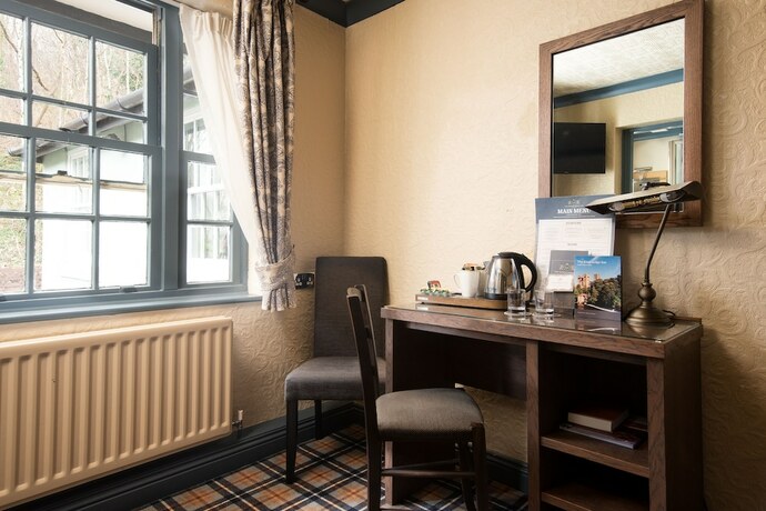 Imagen de la habitación del Hotel The Kingslodge Inn - The Inn Collection Group. Foto 18