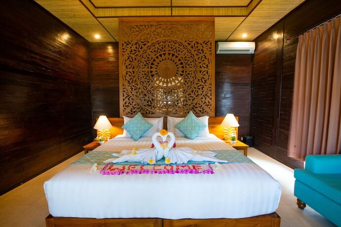 Imagen de la habitación del Hotel The Kirana Tembok. Foto 14