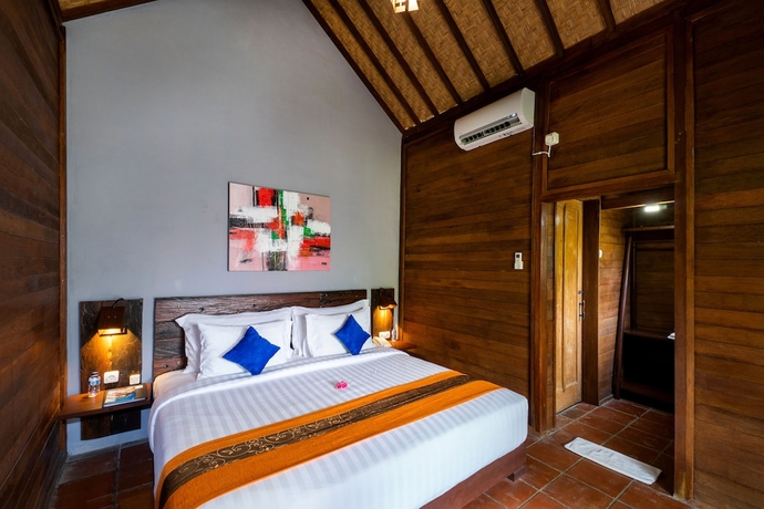 Imagen de la habitación del Hotel The Kirana Ungasan. Foto 5