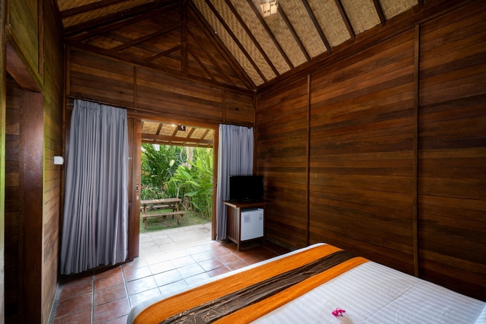 Imagen de la habitación del Hotel The Kirana Ungasan. Foto 12