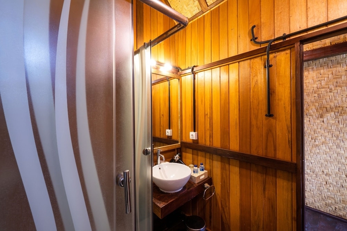 Imagen de la habitación del Hotel The Kirana Ungasan. Foto 14