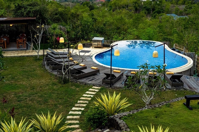 Imagen de la piscina del Hotel The Kirana Ungasan. Foto 18