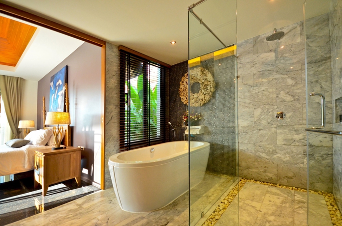 Imagen de la habitación del Hotel The Kiri Villas Resort. Foto 6