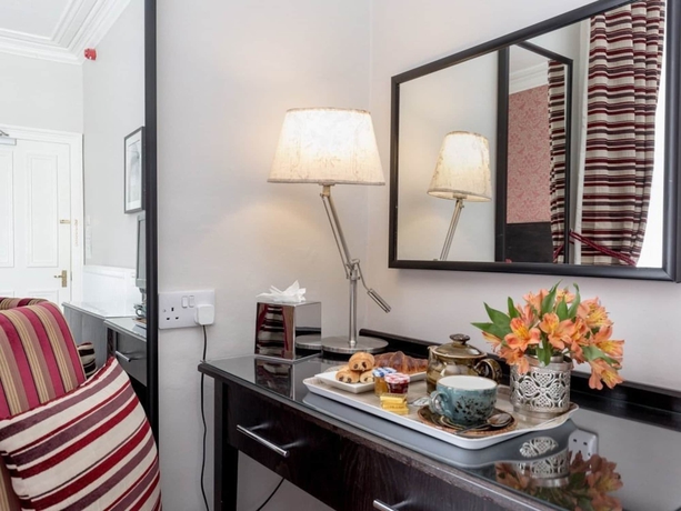 Imagen de la habitación del Hotel The Kirkstyle. Foto 10