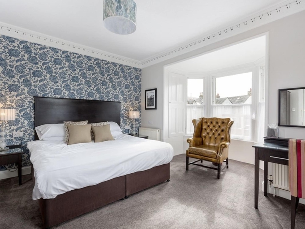 Imagen de la habitación del Hotel The Kirkstyle. Foto 16