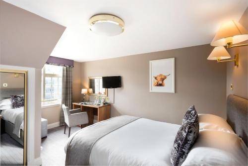 Imagen de la habitación del Hotel The Kithmore. Foto 6