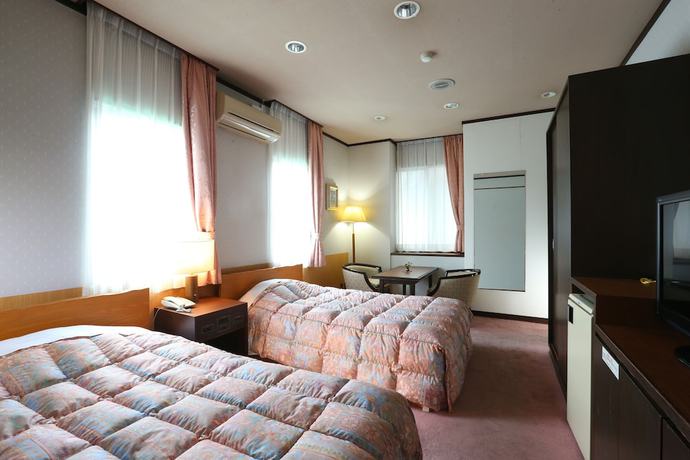 Imagen de la habitación del Hotel The Kizantei. Foto 9