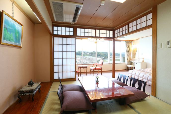 Imagen de la habitación del Hotel The Kizantei. Foto 10