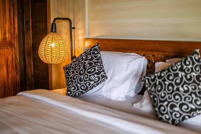 Imagen de la habitación del Hotel The Kleep Jungle Resort. Foto 16